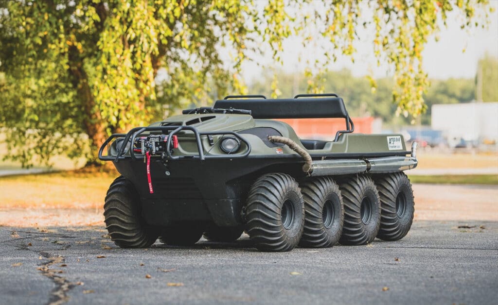 Argo XTV, parked near a tree