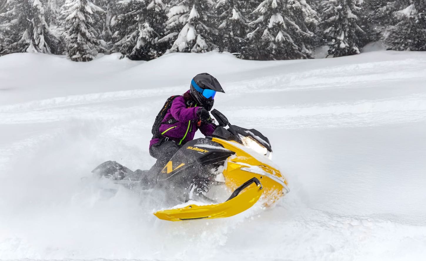 2024 Ski-Doo Summit Neo cruise through powdery snow